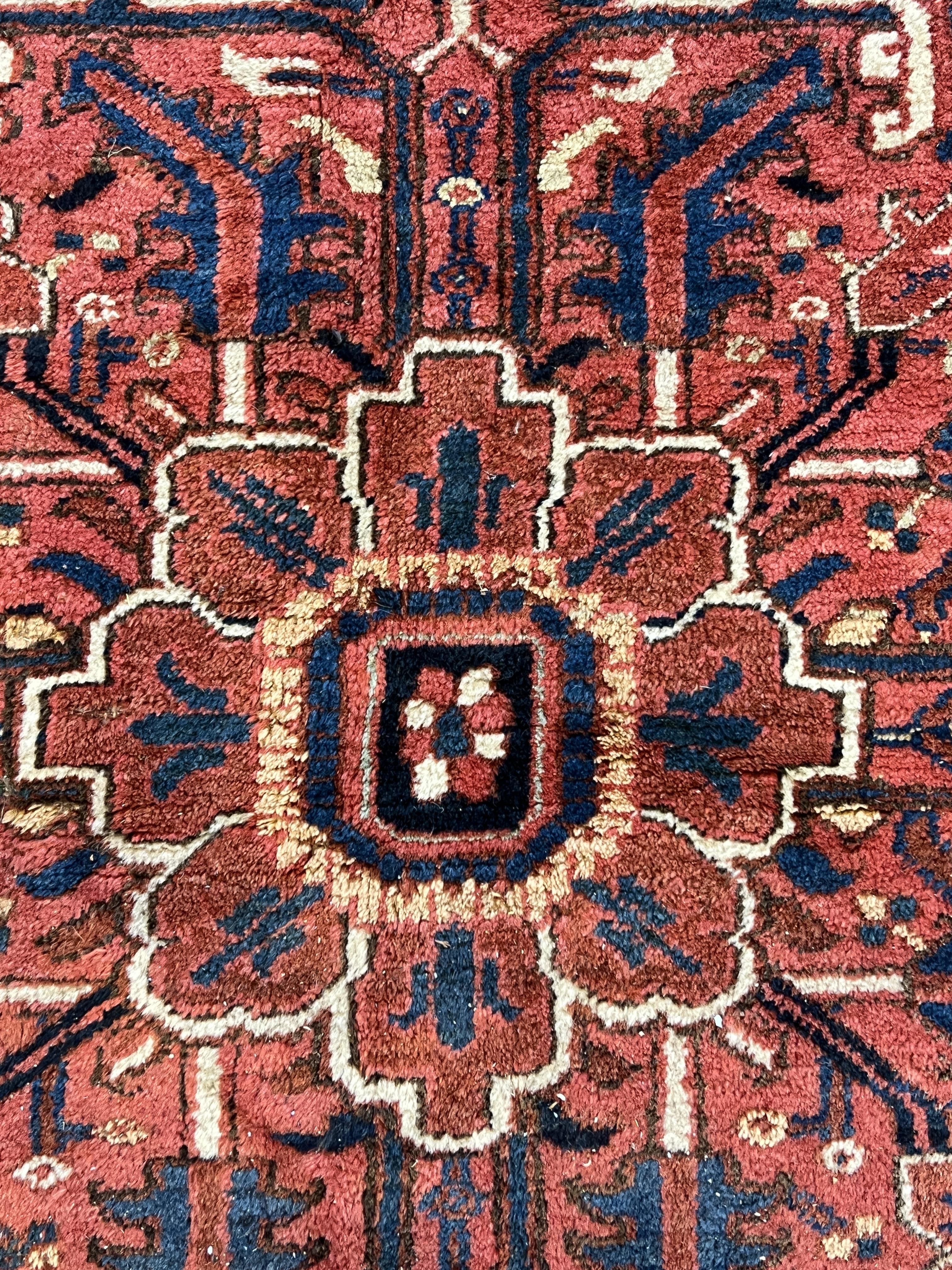 An antique Heriz carpet, 410 x 295cm